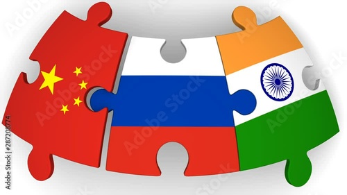 Cooperation of Russia, China and India. Puzzles with flags of Russian Federation, China and India come together. The concept of coincidence of interests in geopolitics. Isolated. Footage video