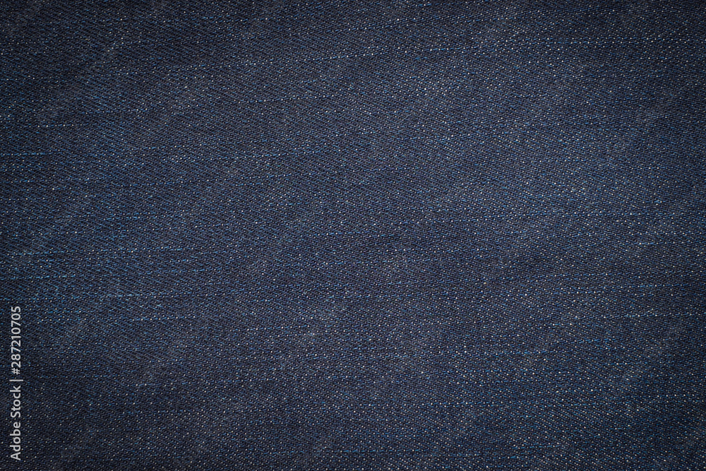 Macro, Close-up of texture details of denim blue jeans. Pattern of fabric or textile is abstract background. Concept design fashion and retro stlye. Macro, Close-up of texture details of denim blue jeans. Pattern of fabric or textile is abstract background. Concept design fashion and retro stlye.