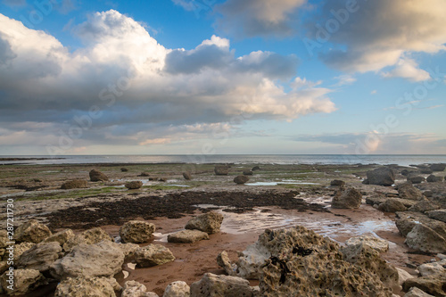 Low tide on the Sussex coast near Eastbourne, with evening light