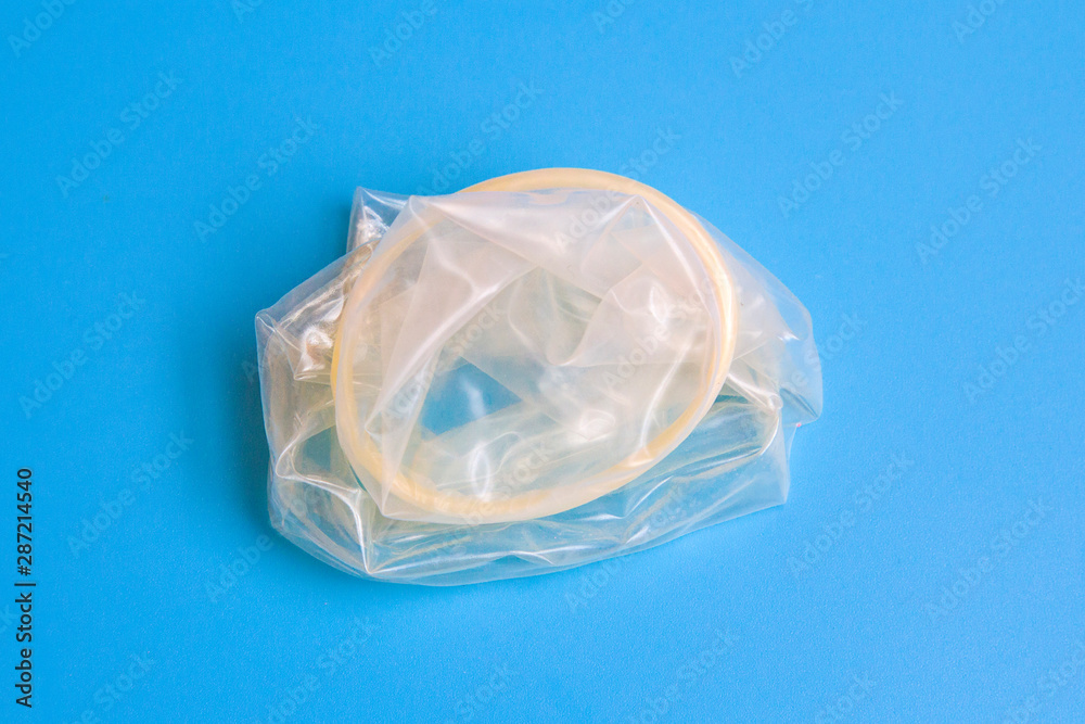 Condom on blue background Condom on blue background