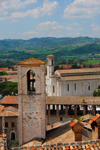 View of Gubbio old medieval historic center with the beautiful Umbrian contryside in the background