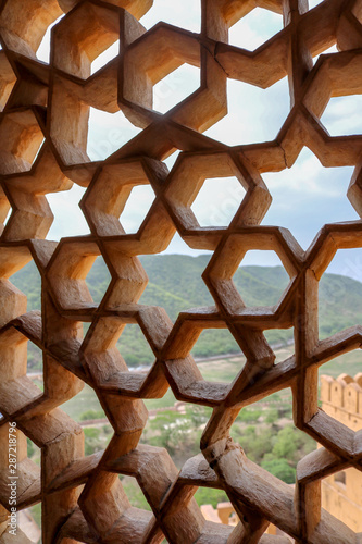 Closeup of a carved window in mogul architecture at Fort Amber, Jaipur, India