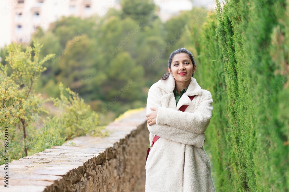 Young indian woman on a nature place Young indian woman on a nature place