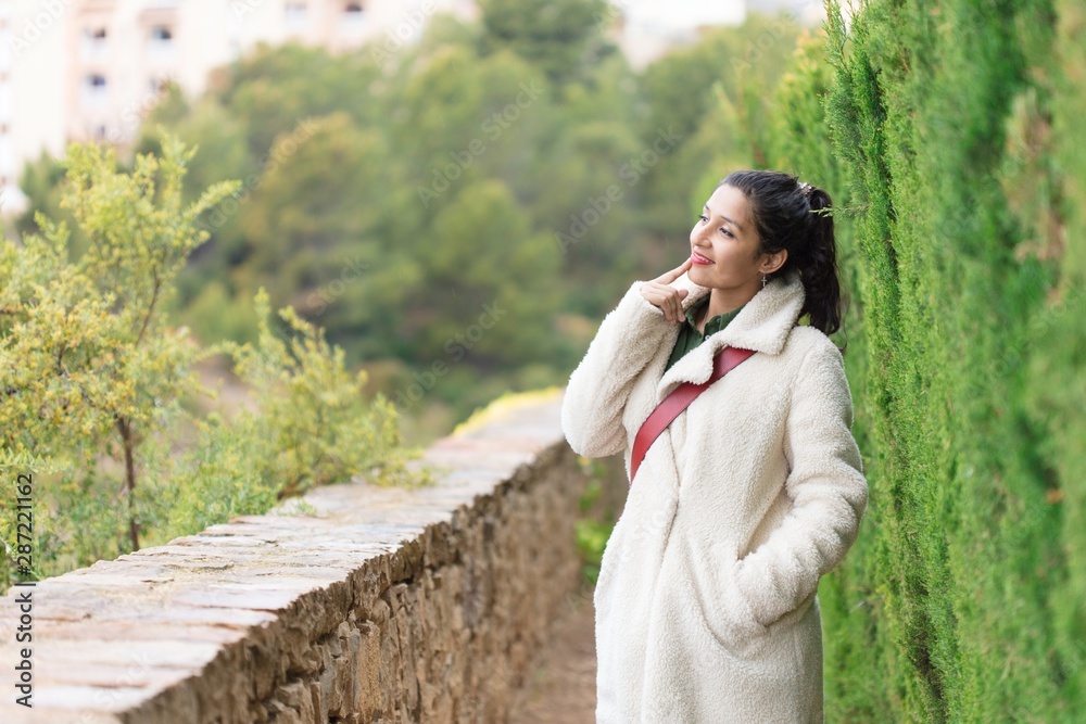 Young indian woman on a nature place Young indian woman on a nature place
