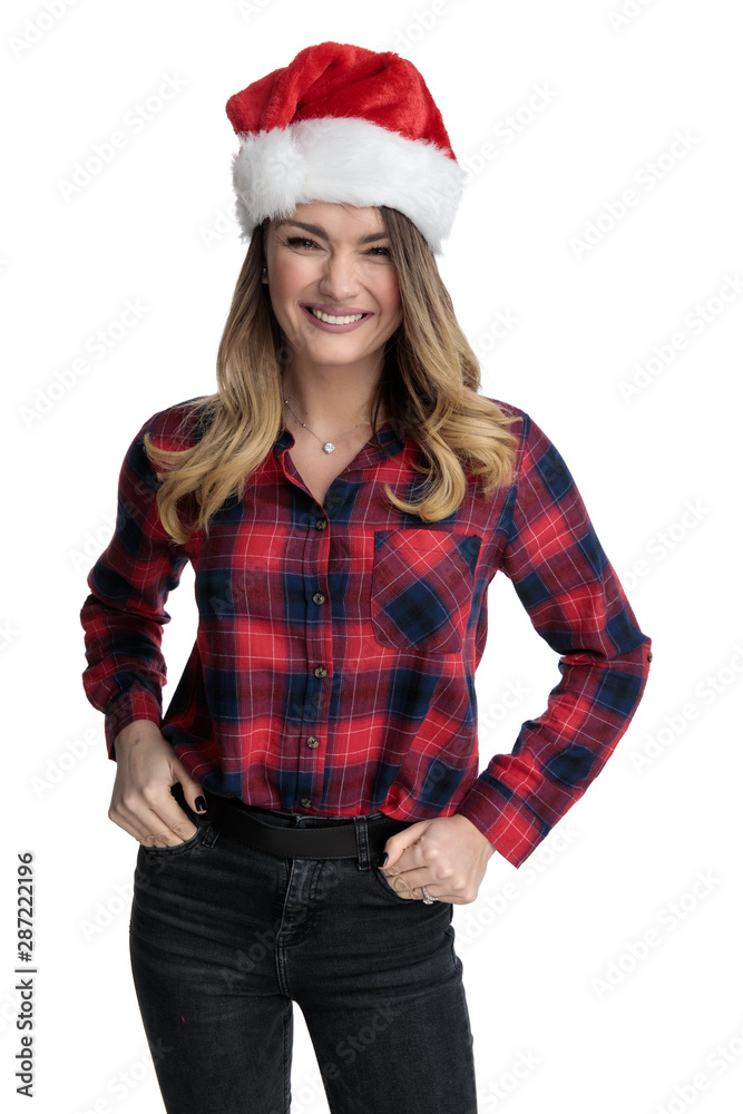 casual woman standing with hands in pockets happy casual woman standing with hands in pockets happy
