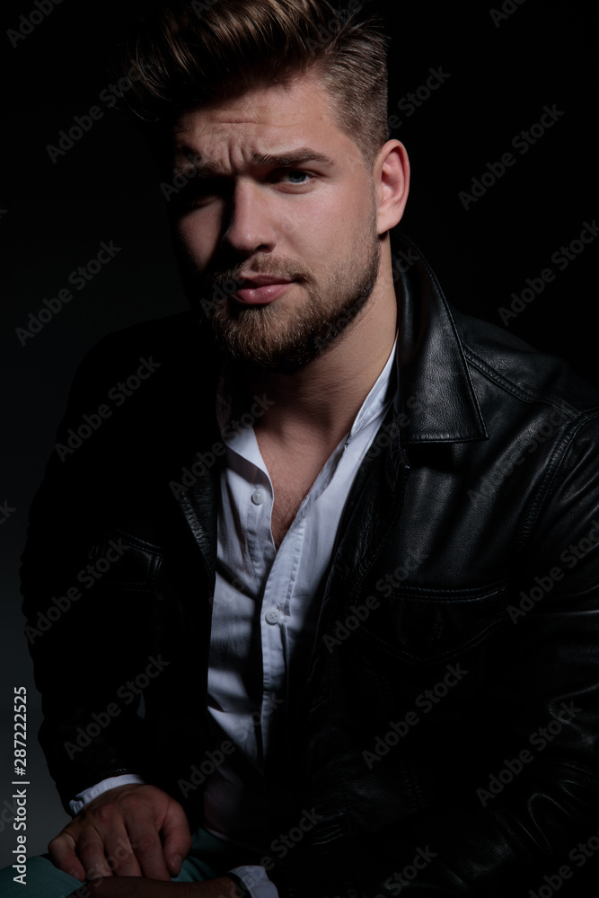 portrait of a cool young man in leather jacket portrait of a cool young man in leather jacket