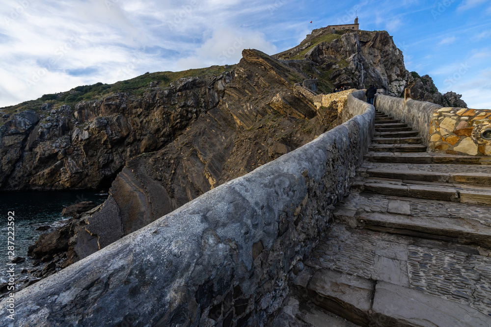 Stone stairway to San Juan de Gaztelugatxe, a famous location for television series, Bermeo, Basque Country, Spain