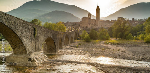 The town of Bobbio and the old medieval bridge. Bobbio, Piacenza province, Emilia Romagna, Italy. photo