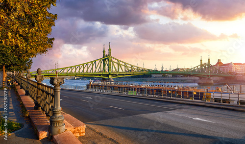 Road at Freedom bridge on Danube river in Budapest city, Hungary.