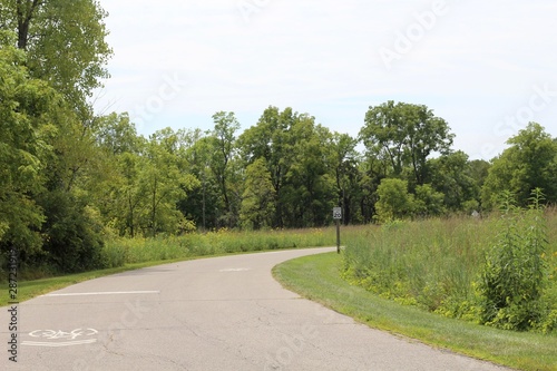 Wallpaper Mural A long empty curve road in the countryside. Torontodigital.ca