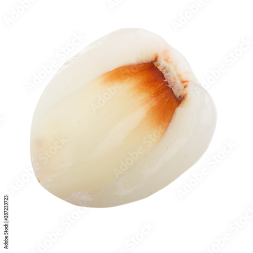 half of shelled lychee with peel isolated on white background