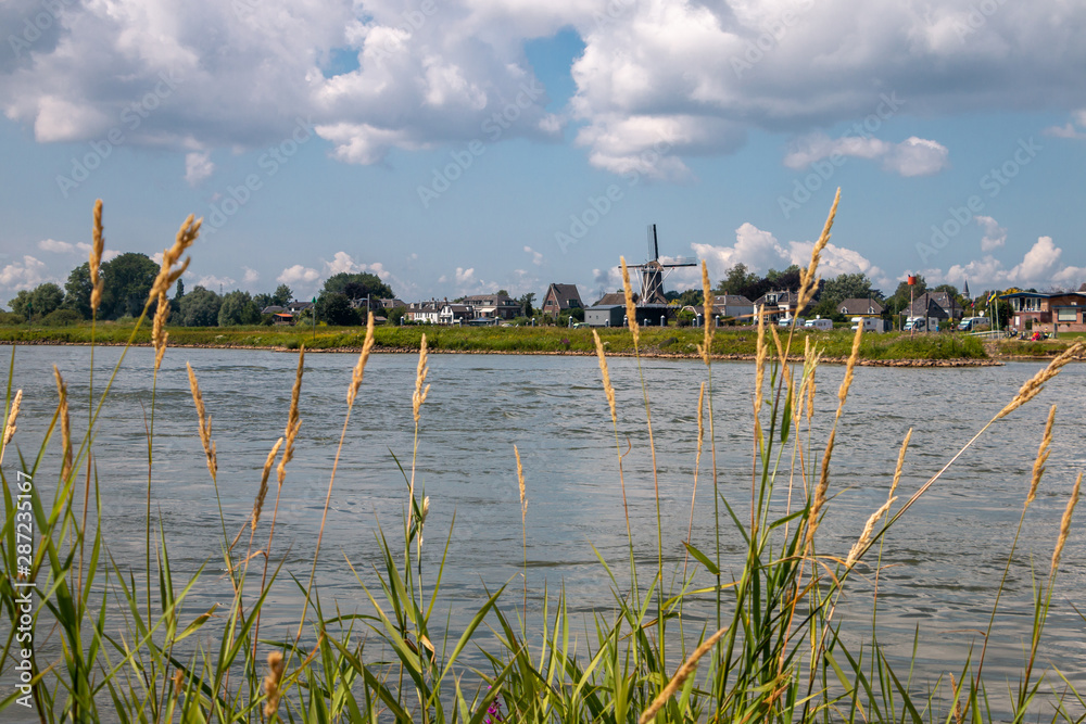 beautiful view at the river the IJssel a rain river meandering trough the provinces Overijssel en Gelderland in the Netherlands
