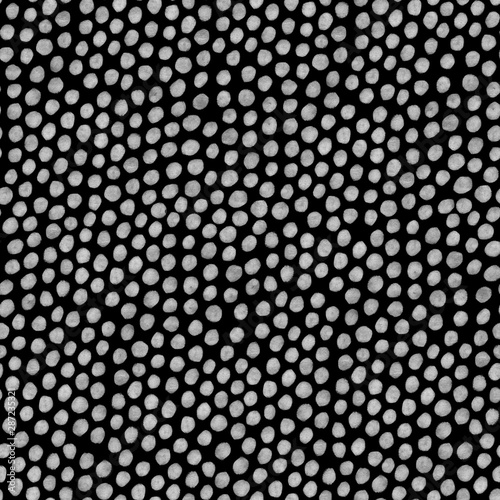 Abstract seamless pattern with white dots on black background 