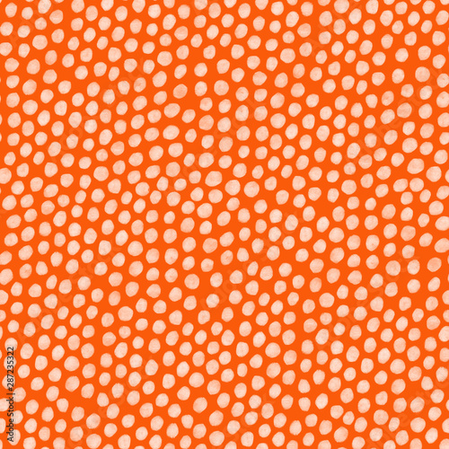 Abstract seamless pattern with white dots on orange background 