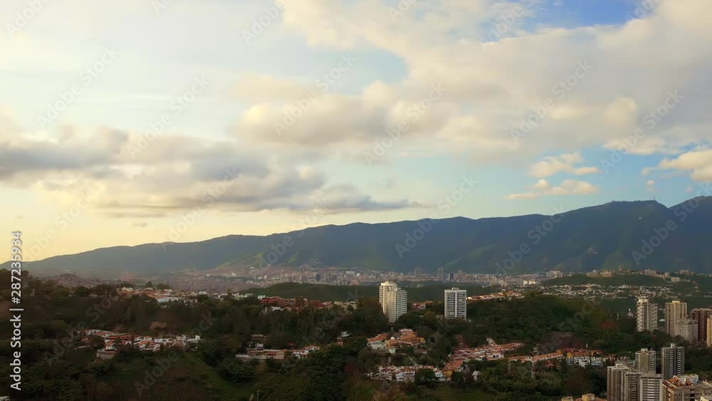 Beautiful Caracas, Venezuelan valley with visible buildings, the avila mountain and the cloudy sky. Left to right pan shot. Beautiful Caracas, Venezuelan valley with visible buildings, the avila mountain and the cloudy sky. Left to right pan shot.