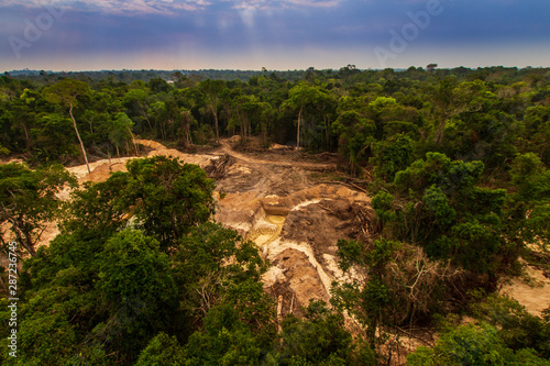 Illegal mining causes deforestation and river pollution in the Amazon rainforest near Menkragnoti Indigenous Land. - Pará, Brazil photo