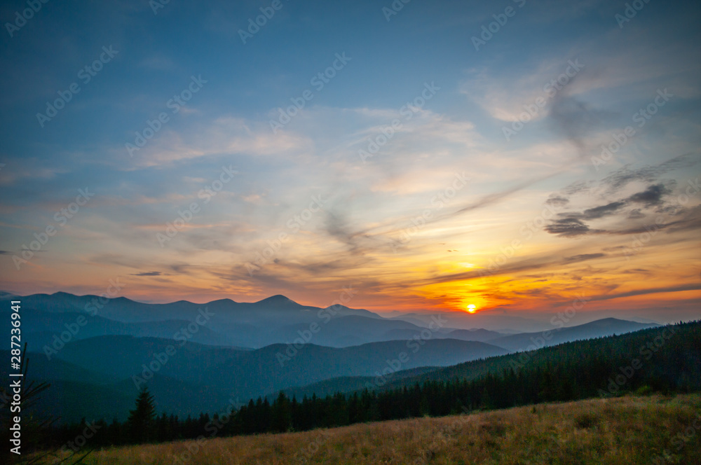 Sunset in the mountains in summer Sunset in the mountains in summer