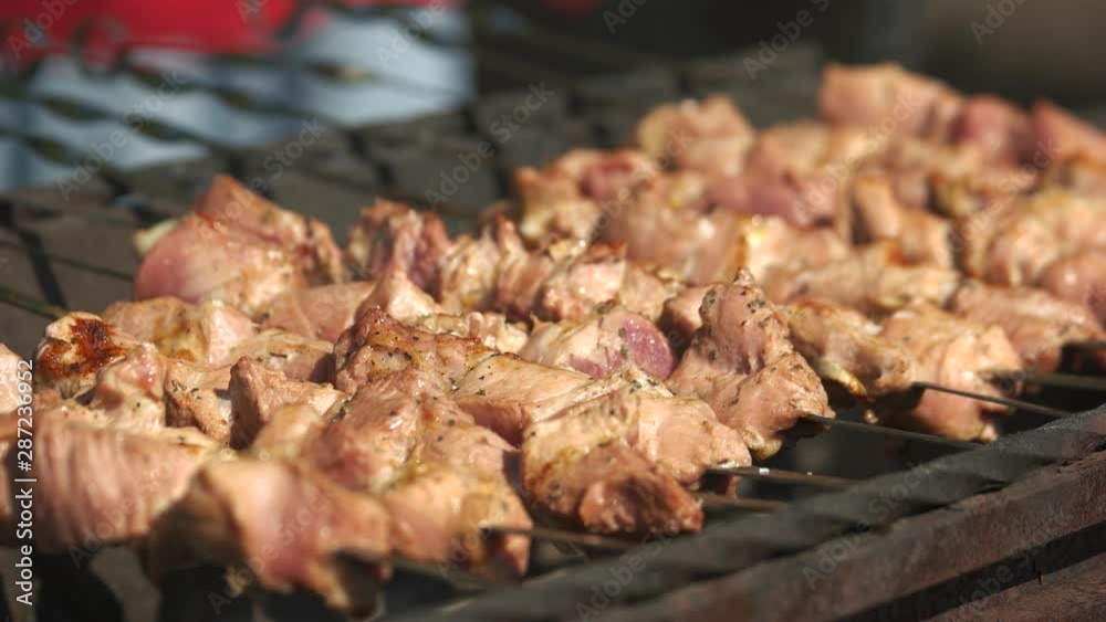 Barbecue on the grill close up. Fresh meat frying on the grill. Best food for gourmet. Barbecue on the grill close up. Fresh meat frying on the grill. Best food for gourmet.