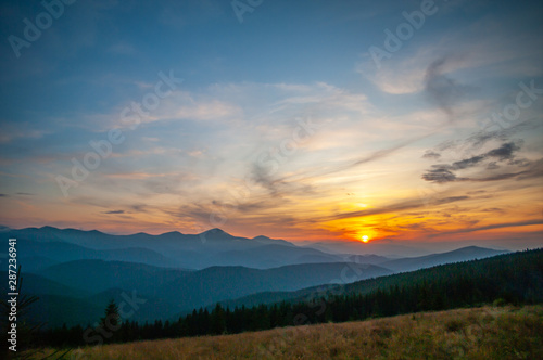 Sunset in the mountains in summer