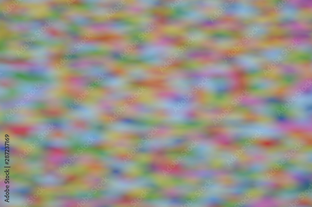 Multicolored background. Many small ellipses. Blurry.