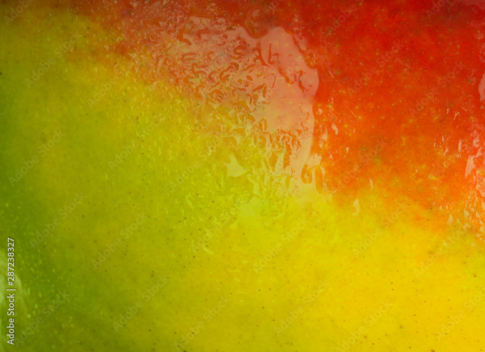  fresh mango green red yellow with water drops background