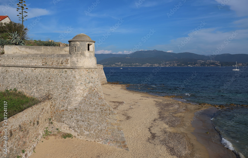 View on the tower of Citadel Miollis and the sea in Ajaccio on Corsica island, France. View on the tower of Citadel Miollis and the sea in Ajaccio on Corsica island, France.