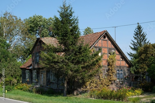 Old, nice wooden house in village in Zulawy (Marshland), Żuławy Elbląskie, Poland