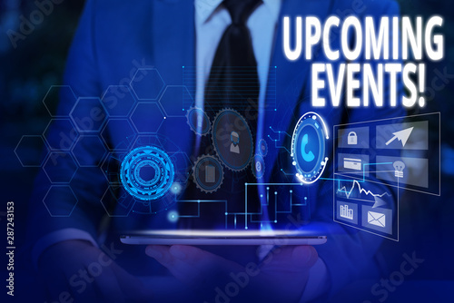Writing note showing Upcoming Events. Business concept for thing that will happens or takes place soon planned occasion Male wear formal suit presenting presentation smart device