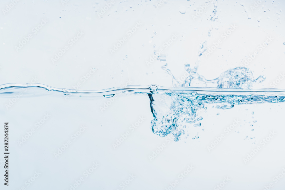 Water splash close up of splash of water forming shape isolated on white background. Water splash close up of splash of water forming shape isolated on white background.