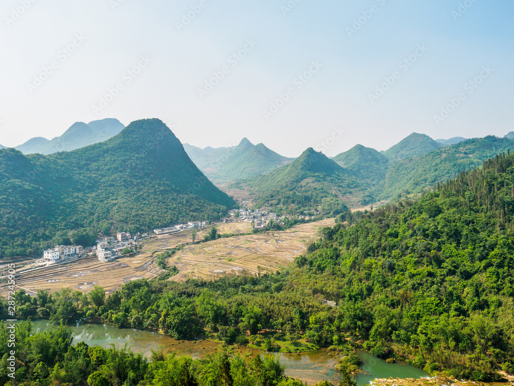 Landscape of the Nine Dragon waterfalls near the City of Luoping (Yunnan Province - China) from above.