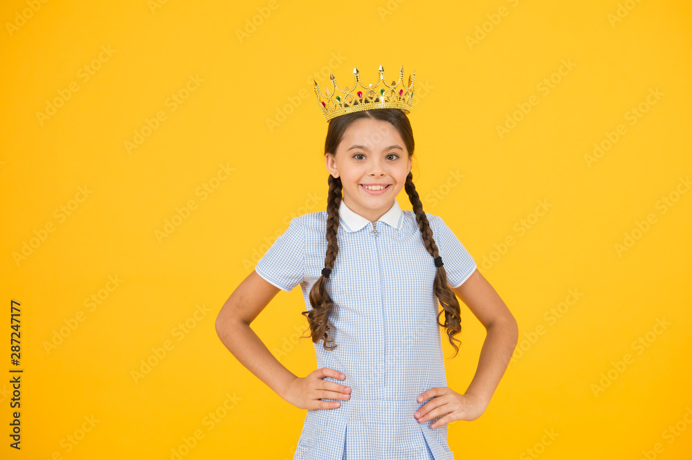 Join luxury class. Succeed in education. Celebrating success. Happy schoolgirl wear golden crown symbol of success. Success and respect. Little princess. Motivational award for school children Join luxury class. Succeed in education. Celebrating success. Happy schoolgirl wear golden crown symbol of success. Success and respect. Little princess. Motivational award for school children