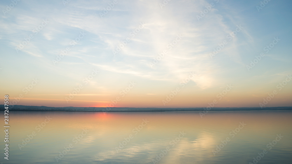 Beautiful red sunset over lake. Composition of nature. Beautiful red sunset over lake. Composition of nature.