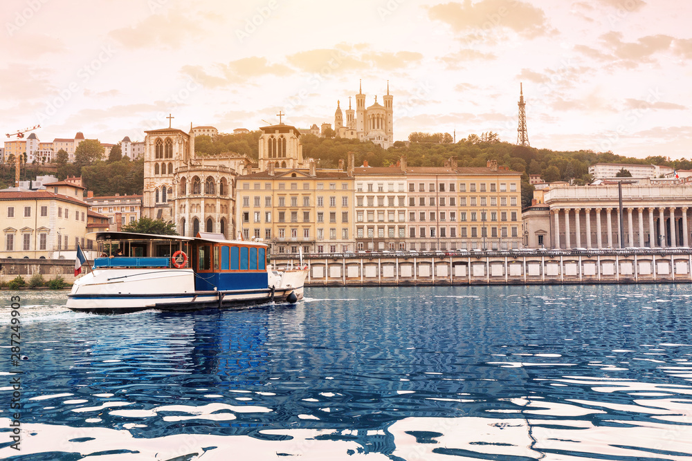 cruise ship on a Saone River in Lyon, France. Tourism and transportation concept