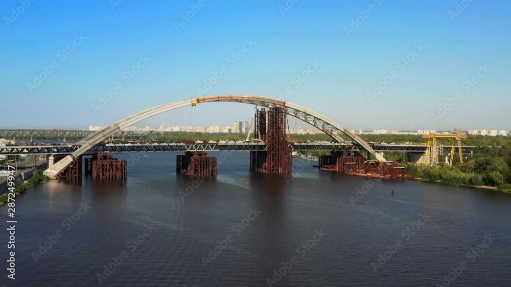 Arch bridge under construction over the river Dnepr Arch bridge under construction over the river Dnepr