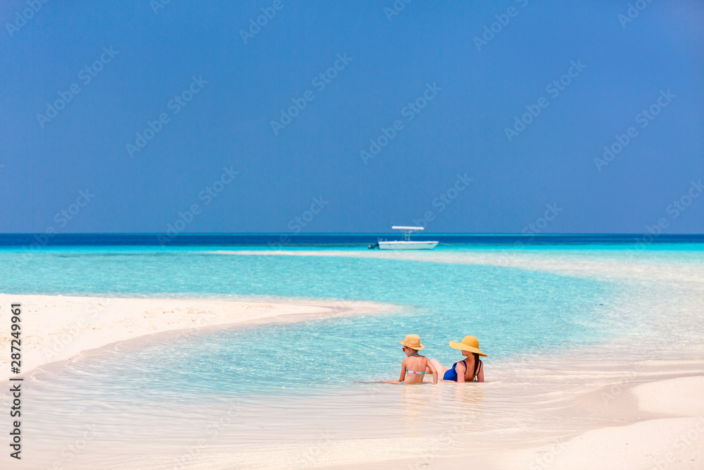 Mother and daughter at beach