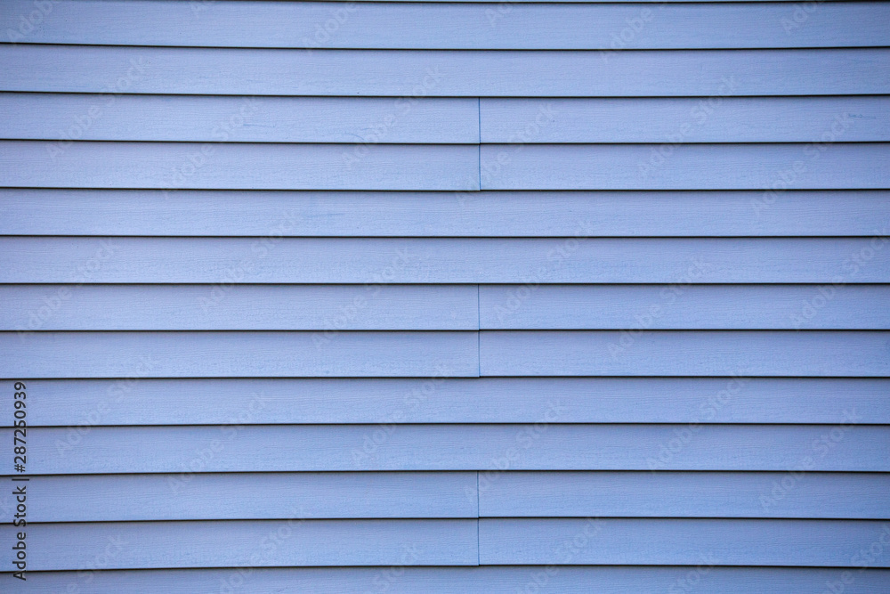 Wooden tiles or shingles typical of the northwestern pacific coast, painted blue. wooden texture and geometrical patterns Wooden tiles or shingles typical of the northwestern pacific coast, painted blue. wooden texture and geometrical patterns
