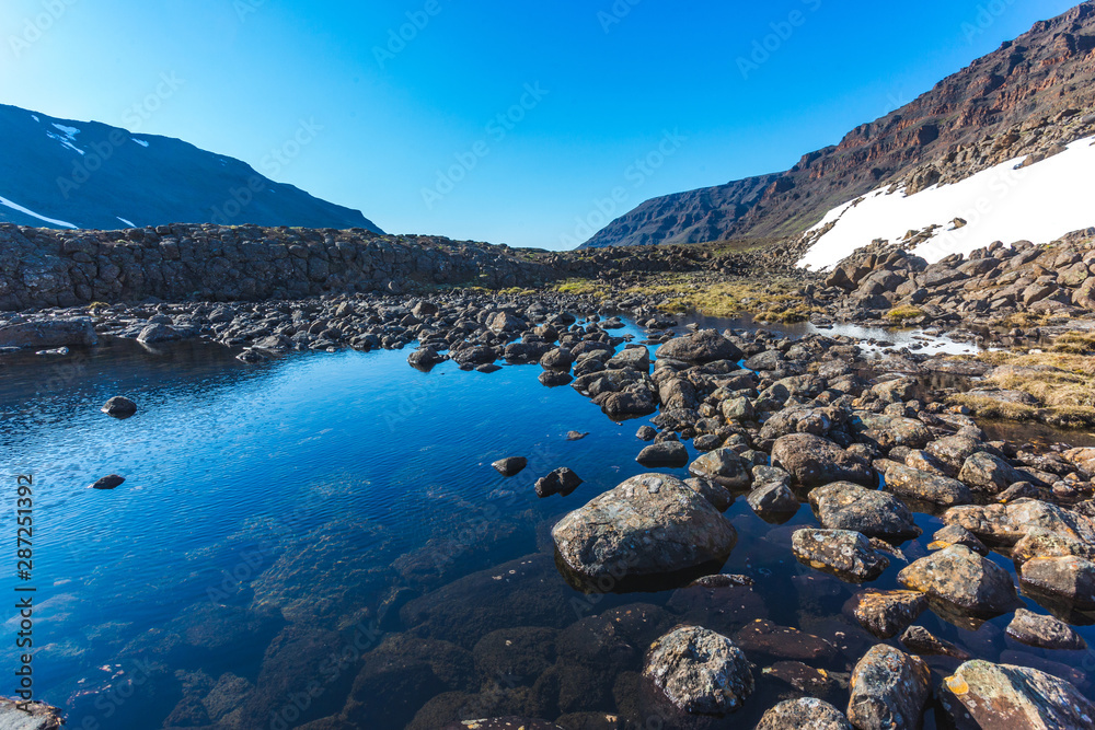 Fototapeta premium Small lake on Putorana Plateau. Russia, Krasnoyarsk region