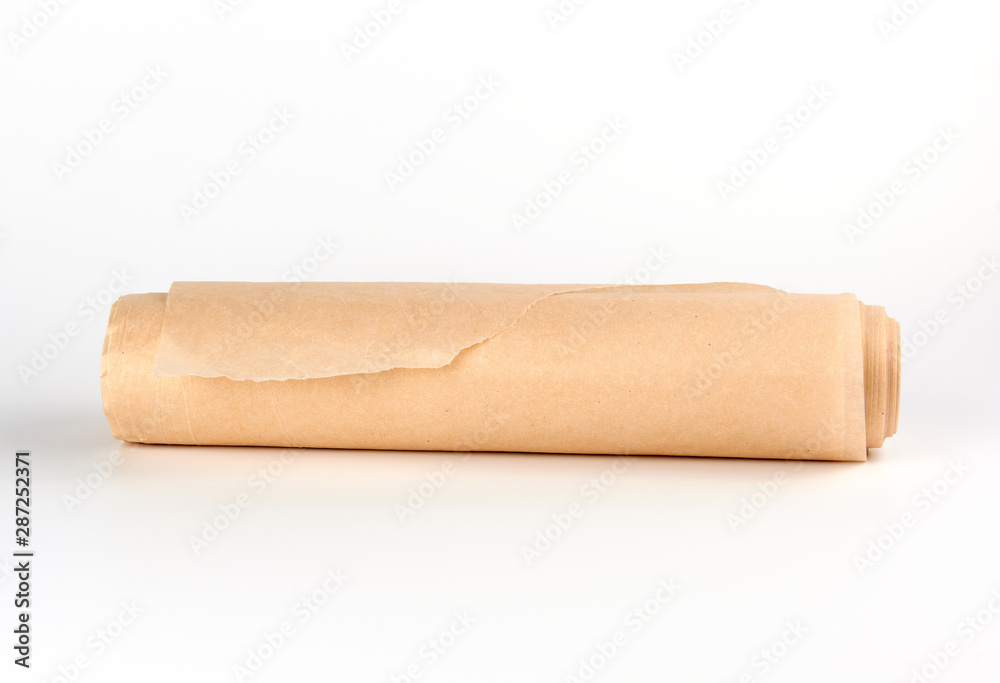 twisted bundle of brown parchment baking paper twisted bundle of brown parchment baking paper