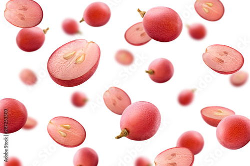 Fotografia Falling red grape, isolated on white background, selective focus