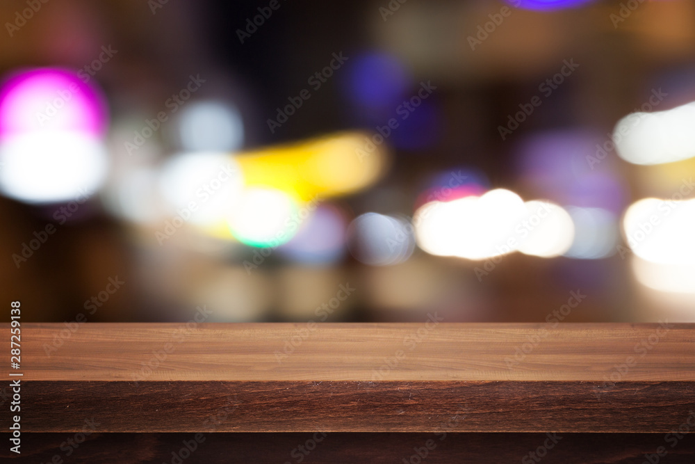Wooden desk on bokeh blur abstract natural background Wooden desk on bokeh blur abstract natural background