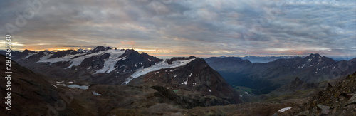 Fototapeta Naklejka Na Ścianę i Meble -  Panorama of sunrise above glacier in European Alps