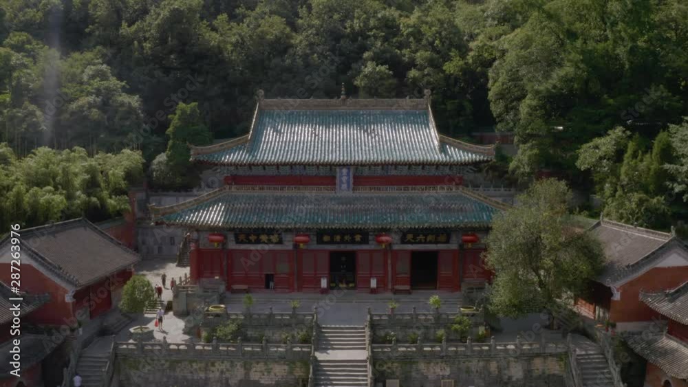 Wudangshan purple palace Taoist temple ornate building, Aerial pull back reveal. Wudangshan purple palace Taoist temple ornate building, Aerial pull back reveal.