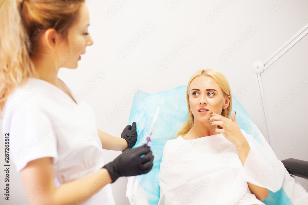 Lip Augmentation In Cosmetology Clinic. Beautiful Woman Getting Beauty Injection For Lips. Lip Augmentation In Cosmetology Clinic. Beautiful Woman Getting Beauty Injection For Lips.
