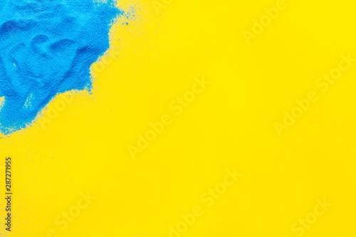 Modern design for blor with blue sand texture on yellow background top view mock up