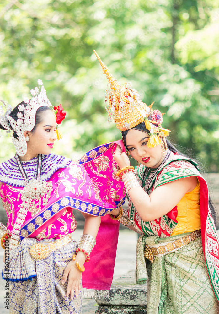 Asian woman wearing typical, traditional Thai Dress. It is literally means 