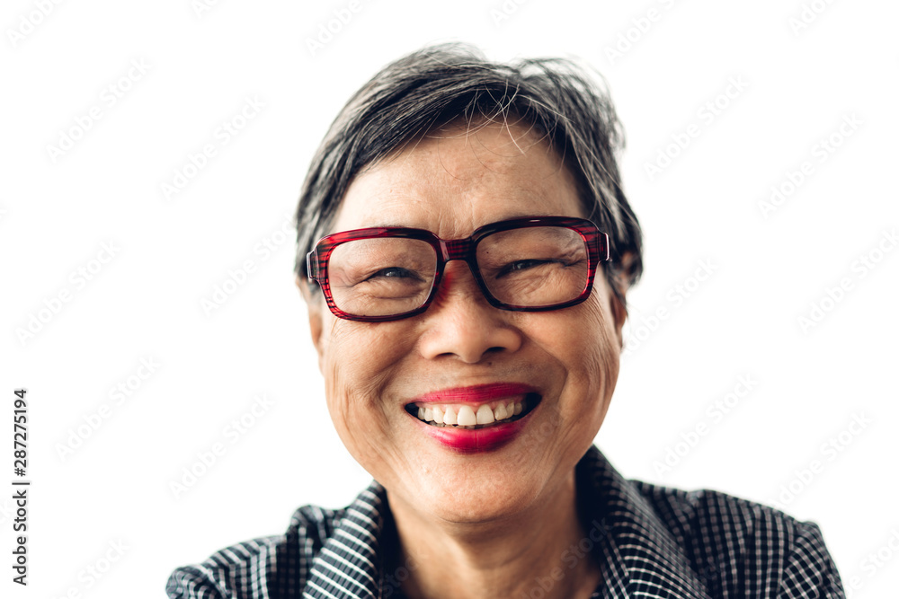 Portrait of happy senior adult elderly asia women smiling and looking at camera on white background.Retirement concept Portrait of happy senior adult elderly asia women smiling and looking at camera on white background.Retirement concept