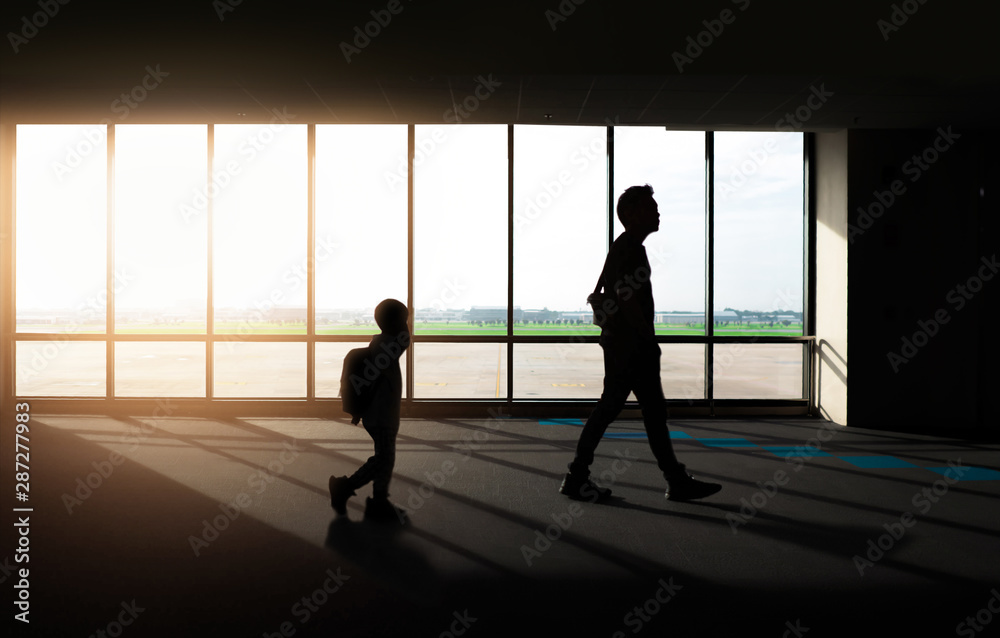 Window with silhouette people at Airport. Window with silhouette people at Airport.