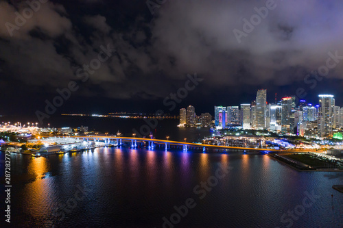 Night aerial bridges to Downtown Miami from port harbor