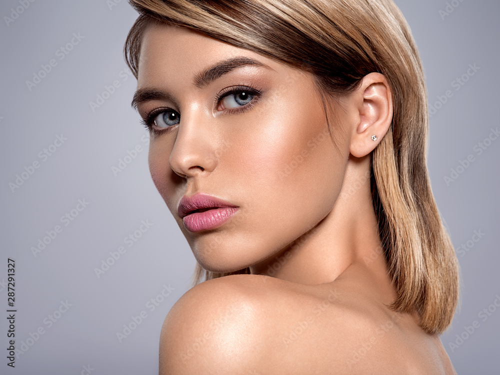 Close-up portrait of sexy caucasian young woman with beautiful blue eyes. Close-up portrait of sexy caucasian young woman with beautiful blue eyes.