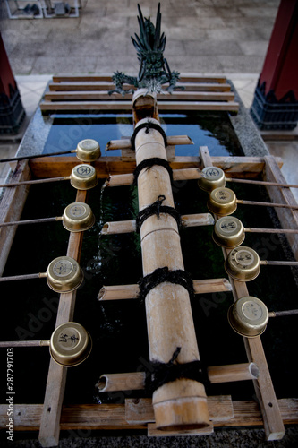 Purification trough at Ikegami honmonji temple in Tokyo photo